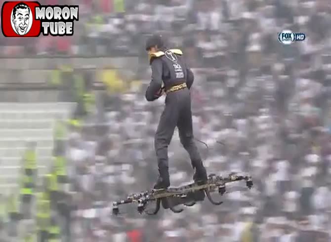 Video :A guy on a flying hoverboard delivers the ball to the referee during the Portuguese Cup final